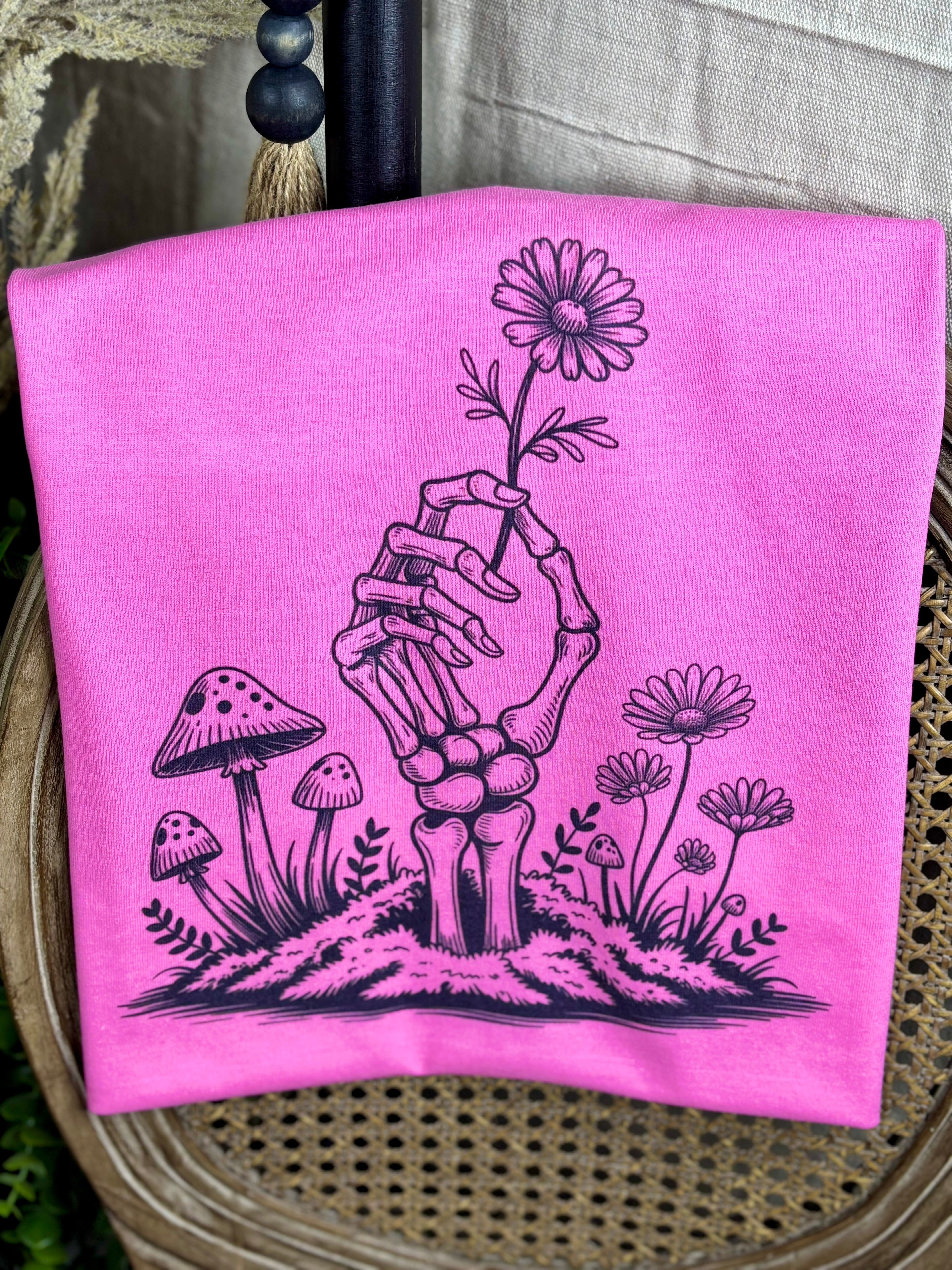 Picking Daisies Skeleton Hand (Tee)