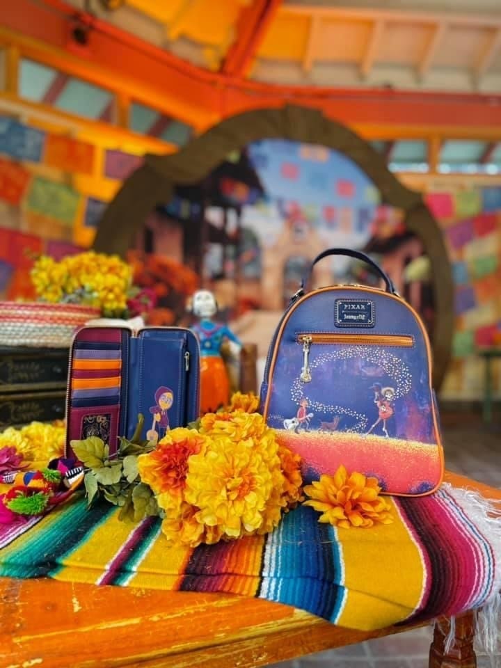LOUNGEFLY Disney Pixar Coco Marigold Bridge Zip Around 
