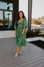 Green Twist Front Cutout Puff Sleeve Eyelet Midi Dress | Fly Boutique Green Twist Front Cutout Puff Sleeve Eyelet Midi Dress | Fly Boutique